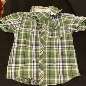 Button up short sleeve shirt.